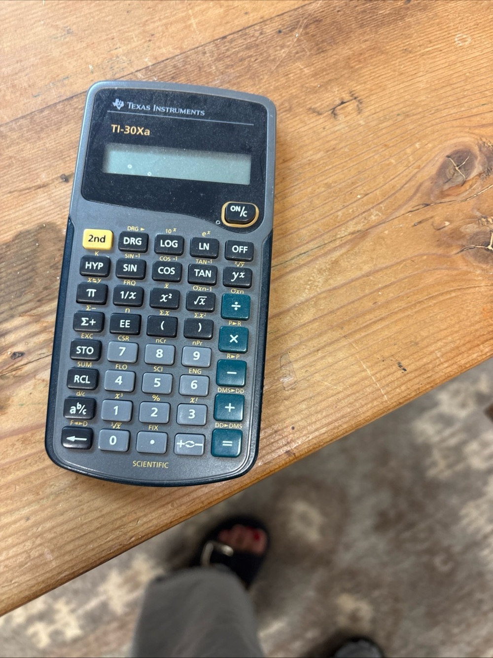 Texas Instruments Black Scientific Calculator with Yellow and Teal Accents